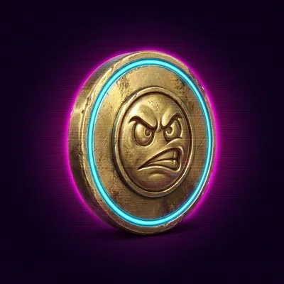 A worn brass arcade token with an angry face stamped on it.
